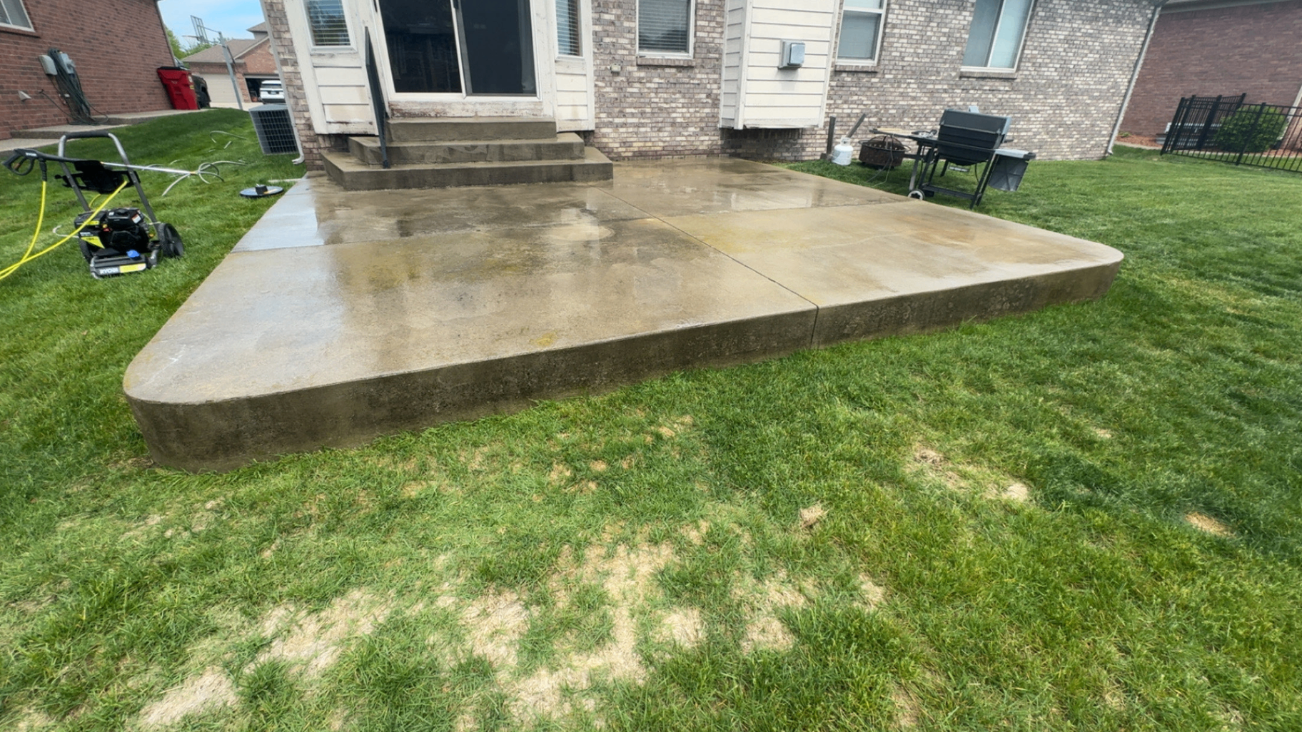 Before: Concrete patio in Macomb County · Soft wash · Same day